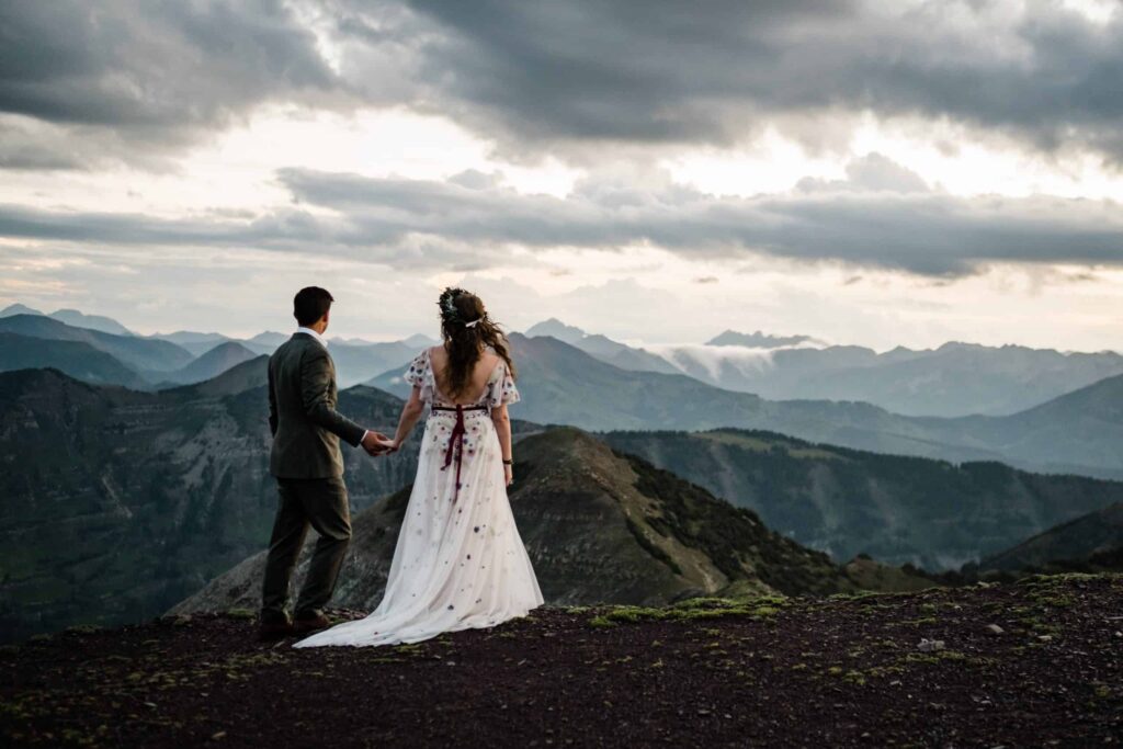 couple eloping on top mountain in Colorado