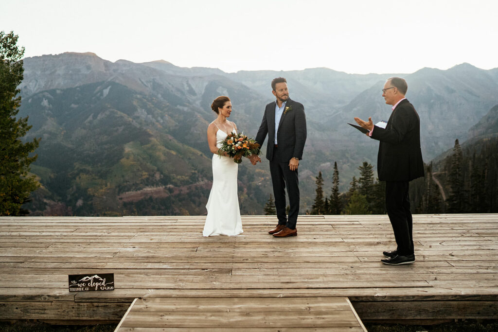 Officiant beginning wedding ceremony at Telluride, Colorado elopement at San Sofia overlook